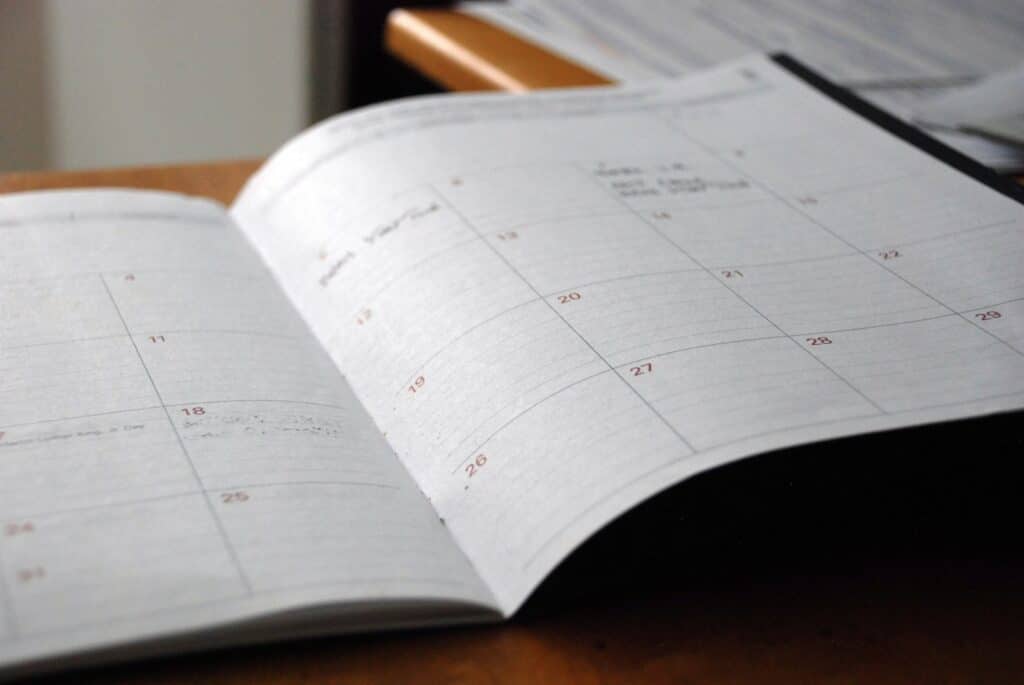 Open monthly planner on a desk, representing the Colorado probate timeline