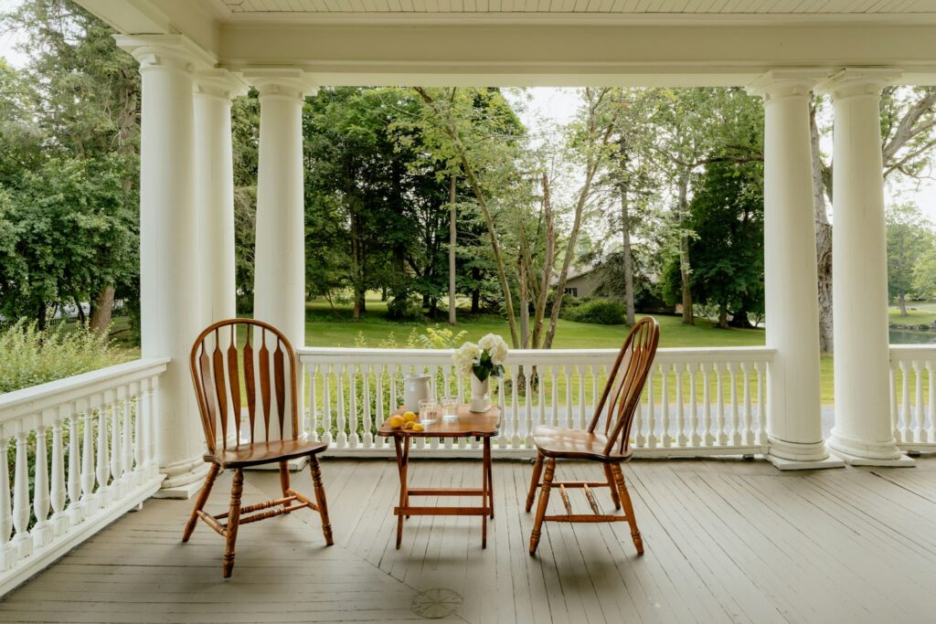 Two chairs on the front porch of a family home inherited in Colorado