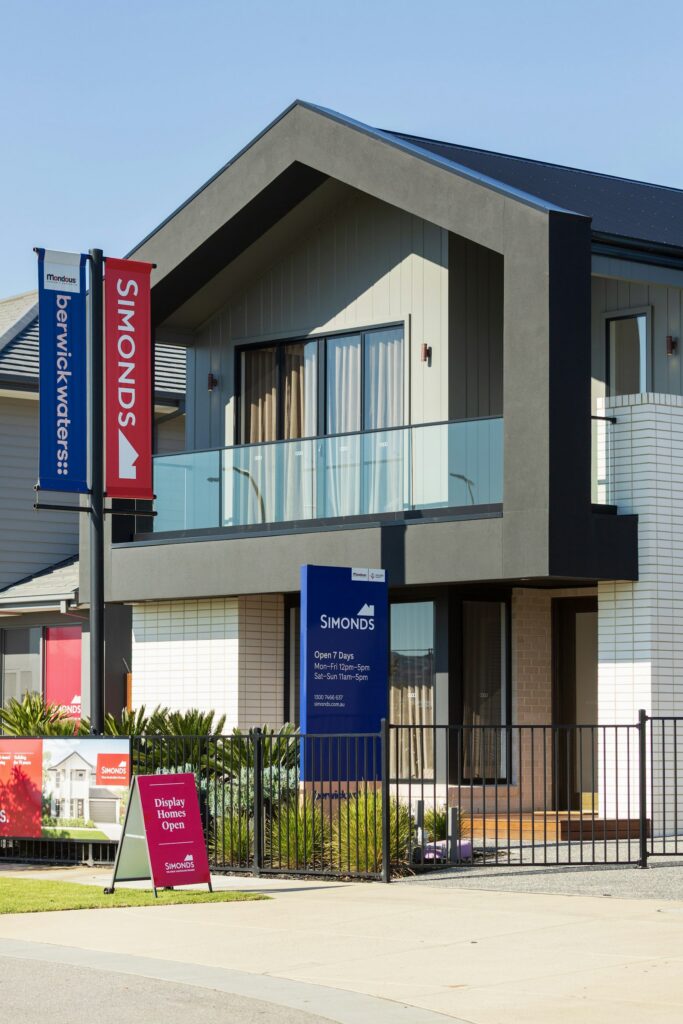 Modern Denver-area home with real estate signs outside, representing a home valuation